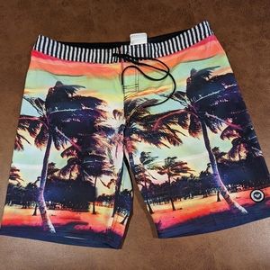 Mens Roxy brand swim trunks size large .